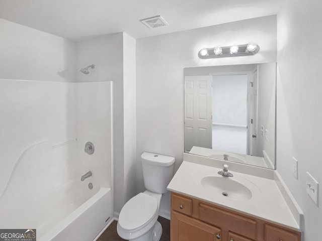 full bathroom with shower / washtub combination, vanity, and toilet