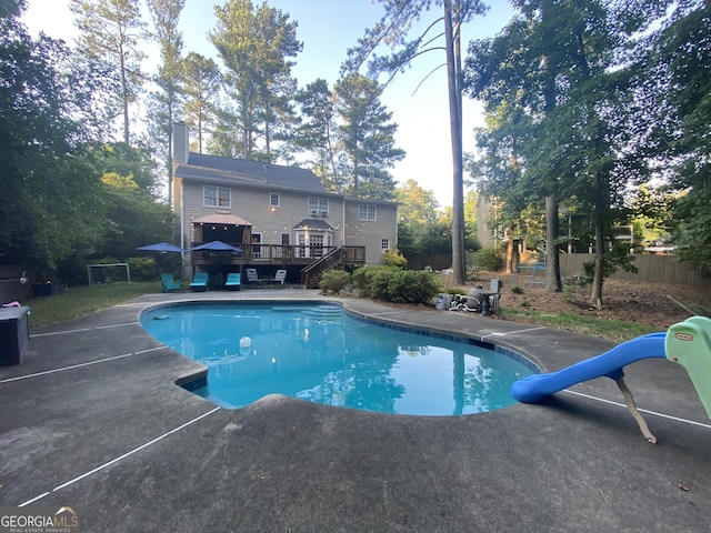 515 Lees Trce SW, Marietta, GA 30064 - outdoor pool featuring a water slide, a deck, and stairs