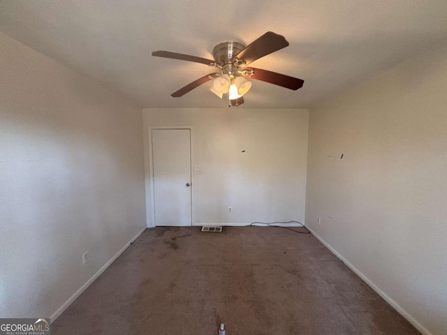 unfurnished room with carpet flooring and ceiling fan