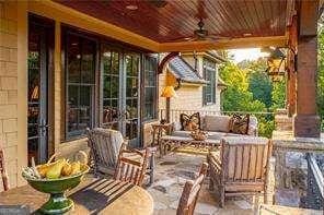 view of patio / terrace with outdoor lounge area and a ceiling fan