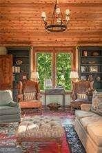 sitting room with a chandelier