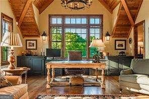 sitting room featuring high vaulted ceiling, wood ceiling, an inviting chandelier, and wood finished floors