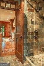 bathroom featuring stone tile floors