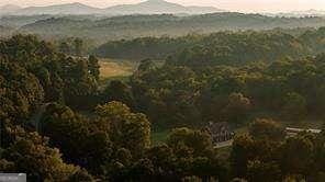 mountain view featuring a wooded view