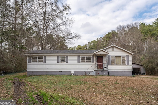 view of front of home featuring a front yard