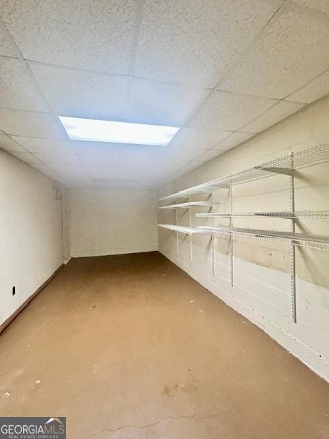 bonus room with concrete flooring