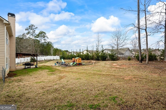 view of yard with a playground