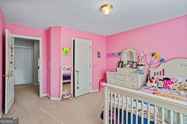 bedroom featuring light colored carpet