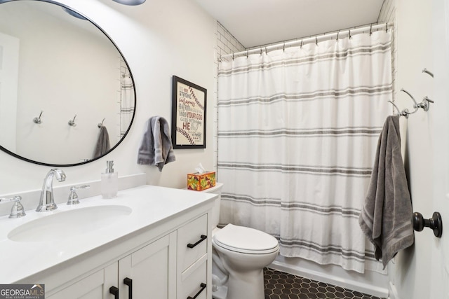 full bathroom with shower / bath combination with curtain, vanity, and toilet