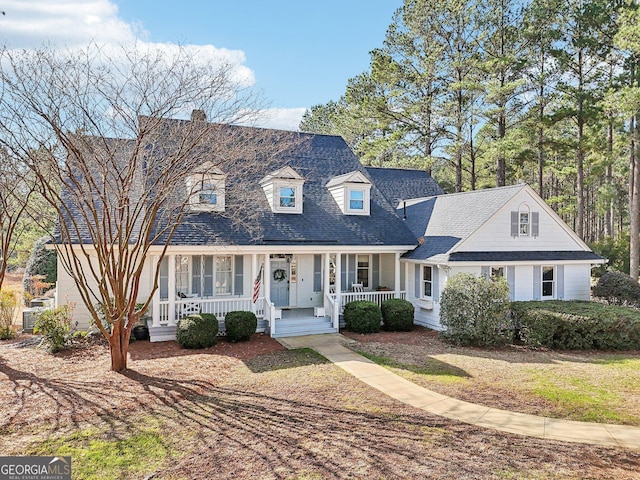 cape cod home with covered porch