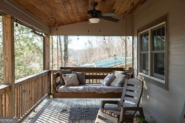 wooden deck with ceiling fan