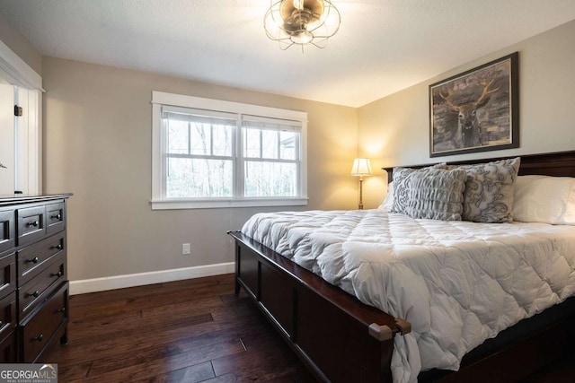 bedroom featuring dark hardwood / wood-style floors