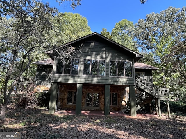 view of front of home featuring a wooden deck