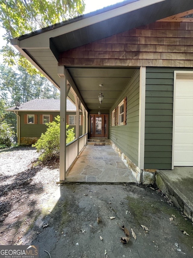 31 Hilltop Dr, Hayesville, NC 28904 - view of patio with a garage