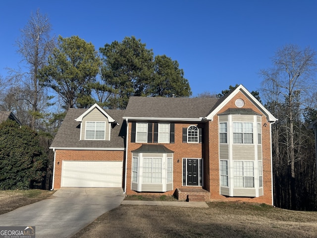 view of front of home with a garage