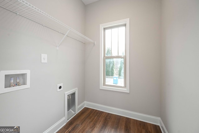 laundry room featuring dark wood-type flooring, washer hookup, and electric dryer hookup