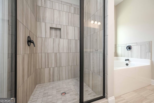 bathroom with plus walk in shower