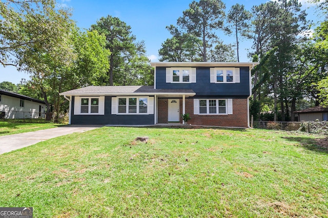 view of front of home featuring a front lawn