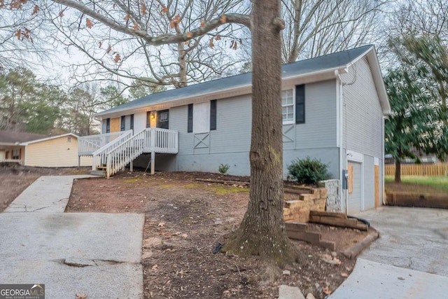 single story home featuring a garage