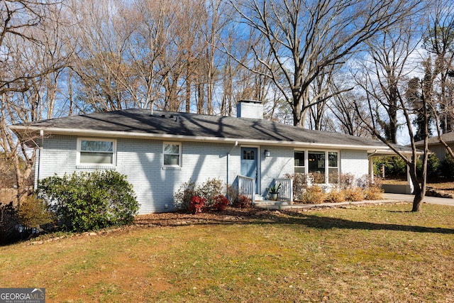 view of front of home with a front lawn