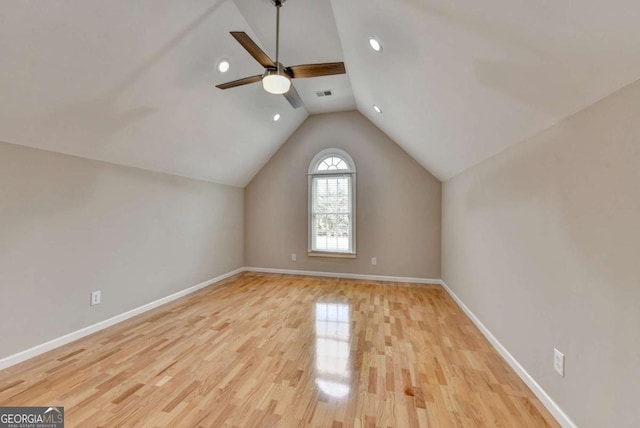 bonus room featuring vaulted ceiling, light hardwood / wood-style floors, and ceiling fan