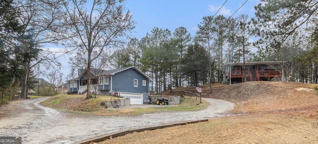 view of side of home with a garage