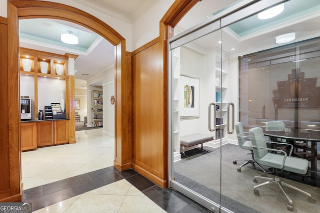 bathroom featuring ornamental molding and tile patterned flooring