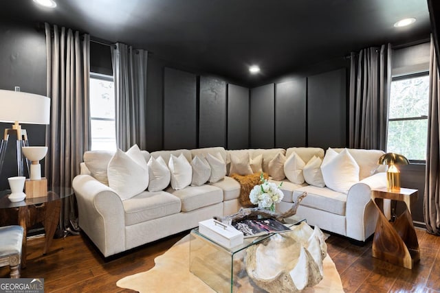 living room with dark hardwood / wood-style floors