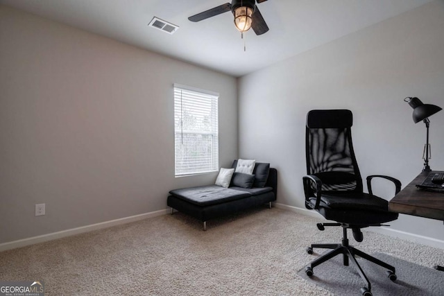 office space featuring ceiling fan and carpet flooring