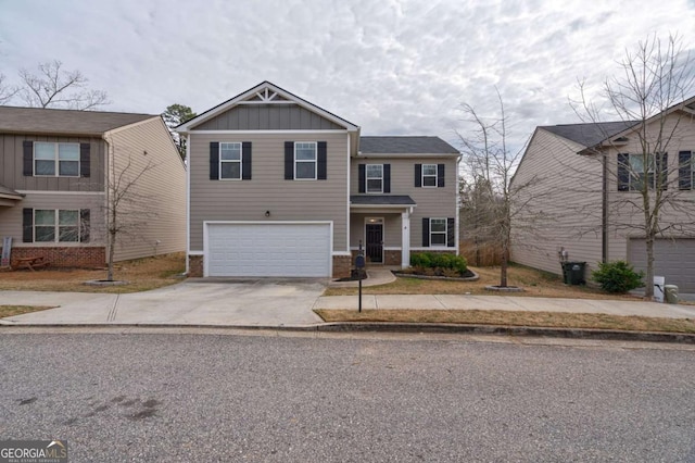 view of front of property with a garage