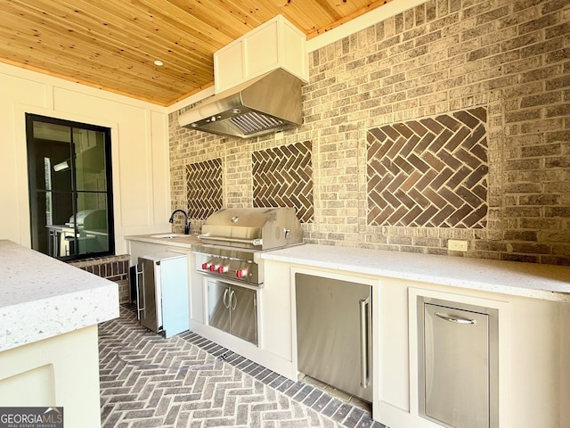 view of patio with a sink, grilling area, and area for grilling