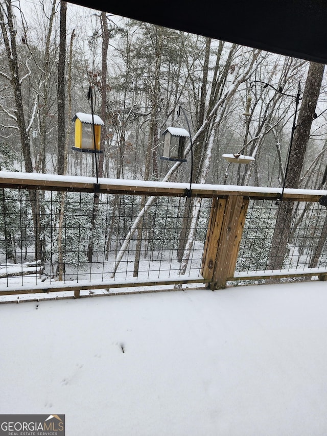 view of snow covered deck