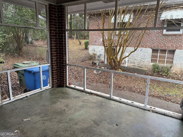 unfurnished sunroom with a healthy amount of sunlight