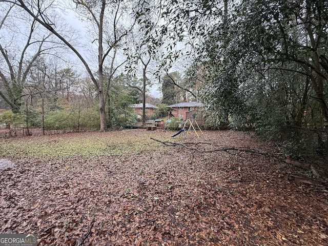 view of yard with a playground