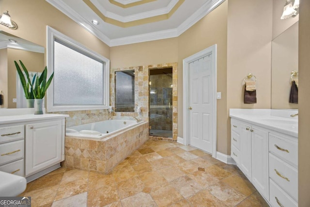 bathroom with ornamental molding, shower with separate bathtub, and vanity