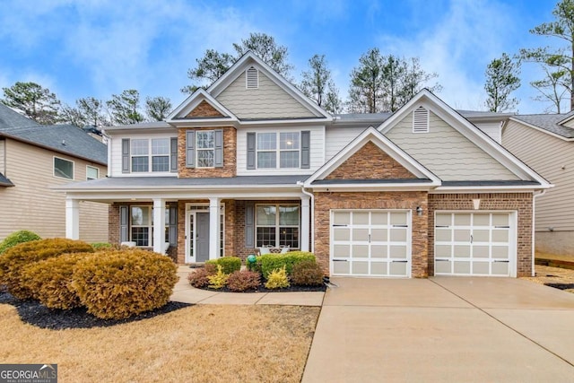 craftsman-style home featuring a garage