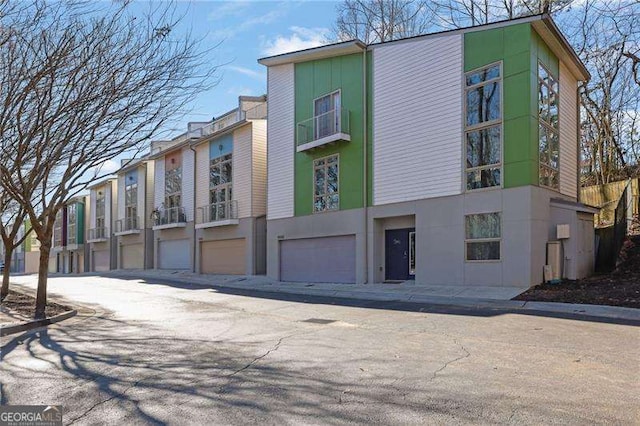 view of building exterior featuring a garage