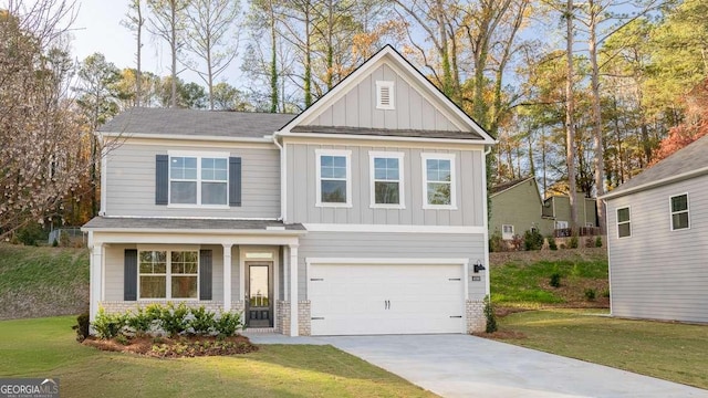 craftsman-style house with a garage and a front lawn