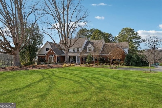 view of front of property with a front lawn