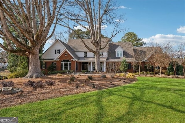 view of front of home featuring a front lawn