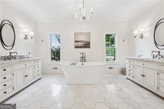 bathroom featuring vanity, ornamental molding, and a tub