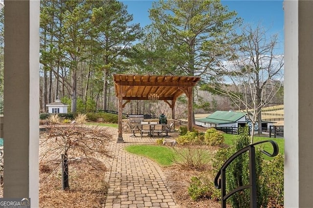 exterior space featuring a pergola