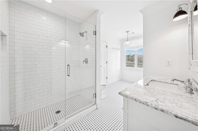 bathroom featuring vanity and walk in shower