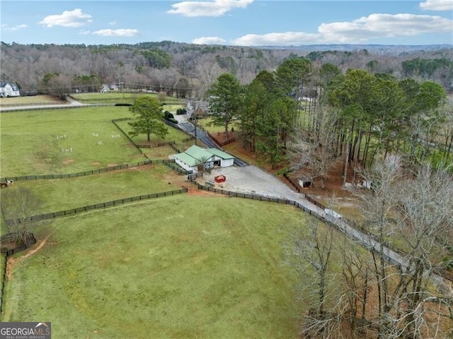 birds eye view of property featuring a rural view