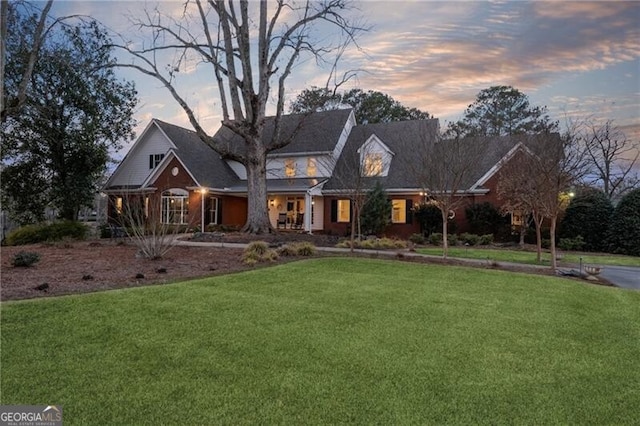 view of front of home featuring a yard