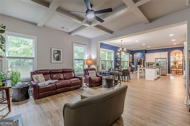 3157 Oakdale Rd, Hapeville, GA 30354 - living area featuring coffered ceiling, arched walkways, light wood-style flooring, a chandelier, and beamed ceiling