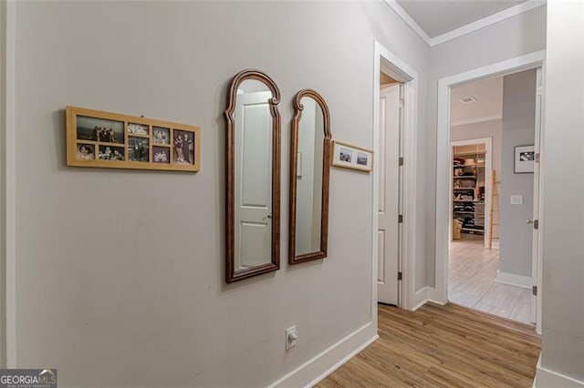 3157 Oakdale Rd, Hapeville, GA 30354 - corridor featuring ornamental molding, wood finished floors, and baseboards