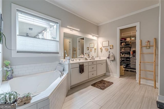 3157 Oakdale Rd, Hapeville, GA 30354 - full bath featuring ornamental molding, a bath, vanity, and a walk in closet
