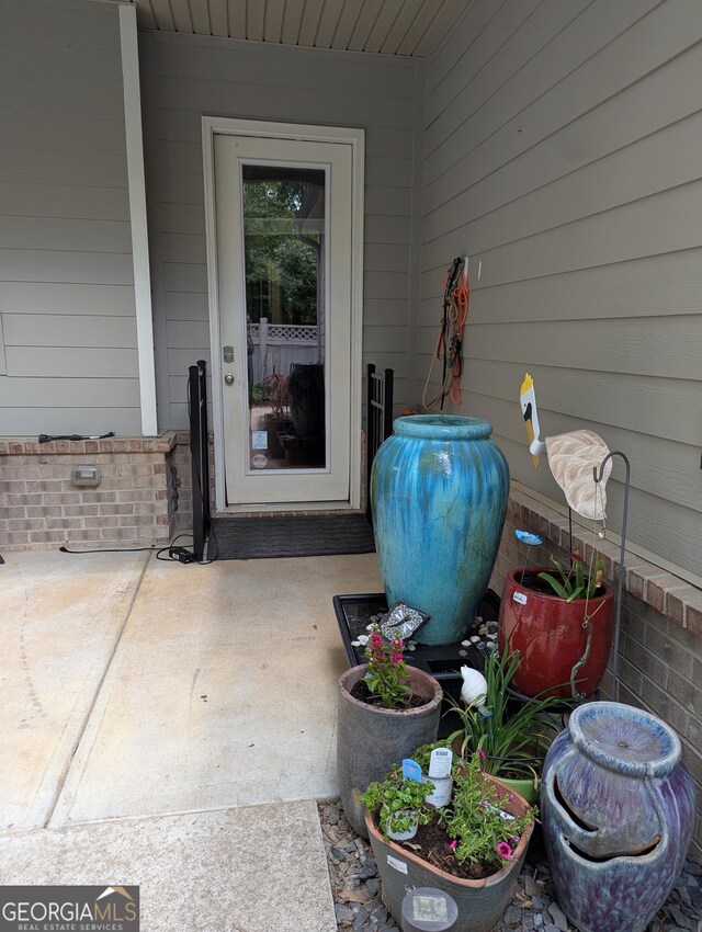 3157 Oakdale Rd, Hapeville, GA 30354 - washroom with cabinet space, separate washer and dryer, ornamental molding, and baseboards