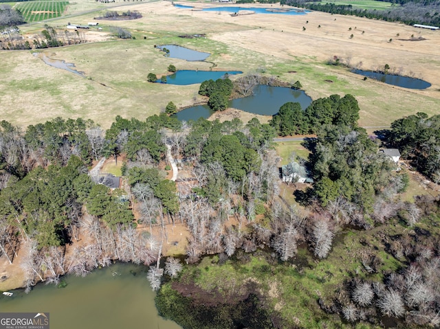 bird's eye view with a rural view and a water view